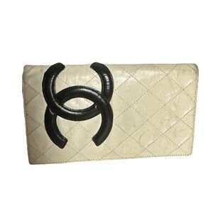 CHANEL Black and Cream Quilted Clutch